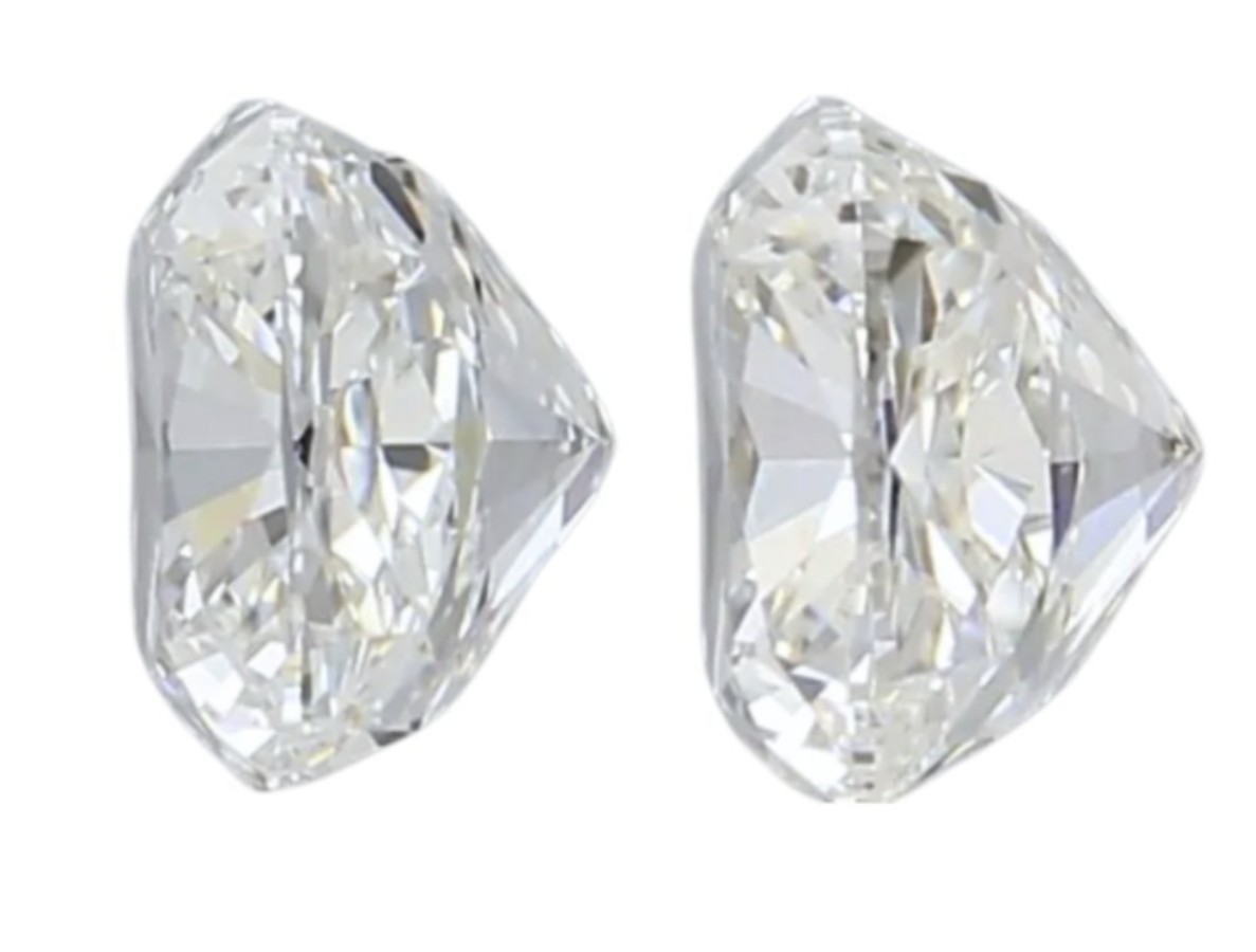(GIA) 1.00CT ET PAR HØYKVALITETS PUTESLIPTE NATURLIGE DIAMANTER. G-H/VVS1-VVS2.
